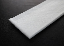 Load image into Gallery viewer, Xceed Towels refresher towel on black background without packaging