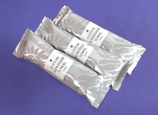 3 Xceed Towels Cotton 15 towels in packaging on purple background