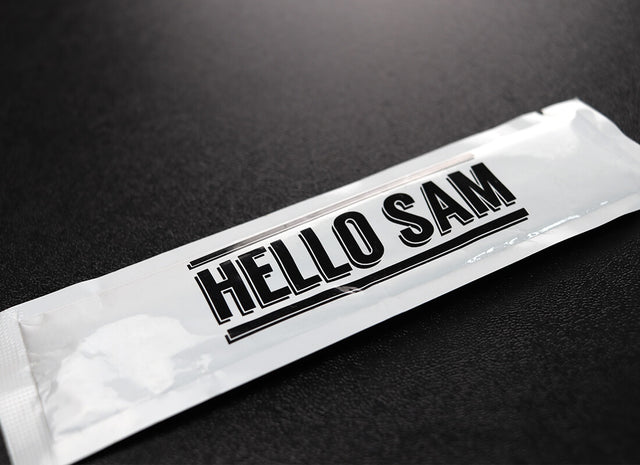 Custom-printed refresher towel wrapper