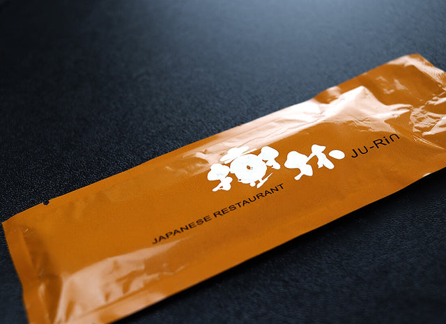 Custom-printed refresher towel wrapper