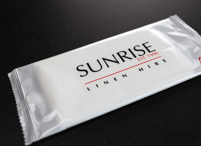 Custom-printed refresher towel wrapper