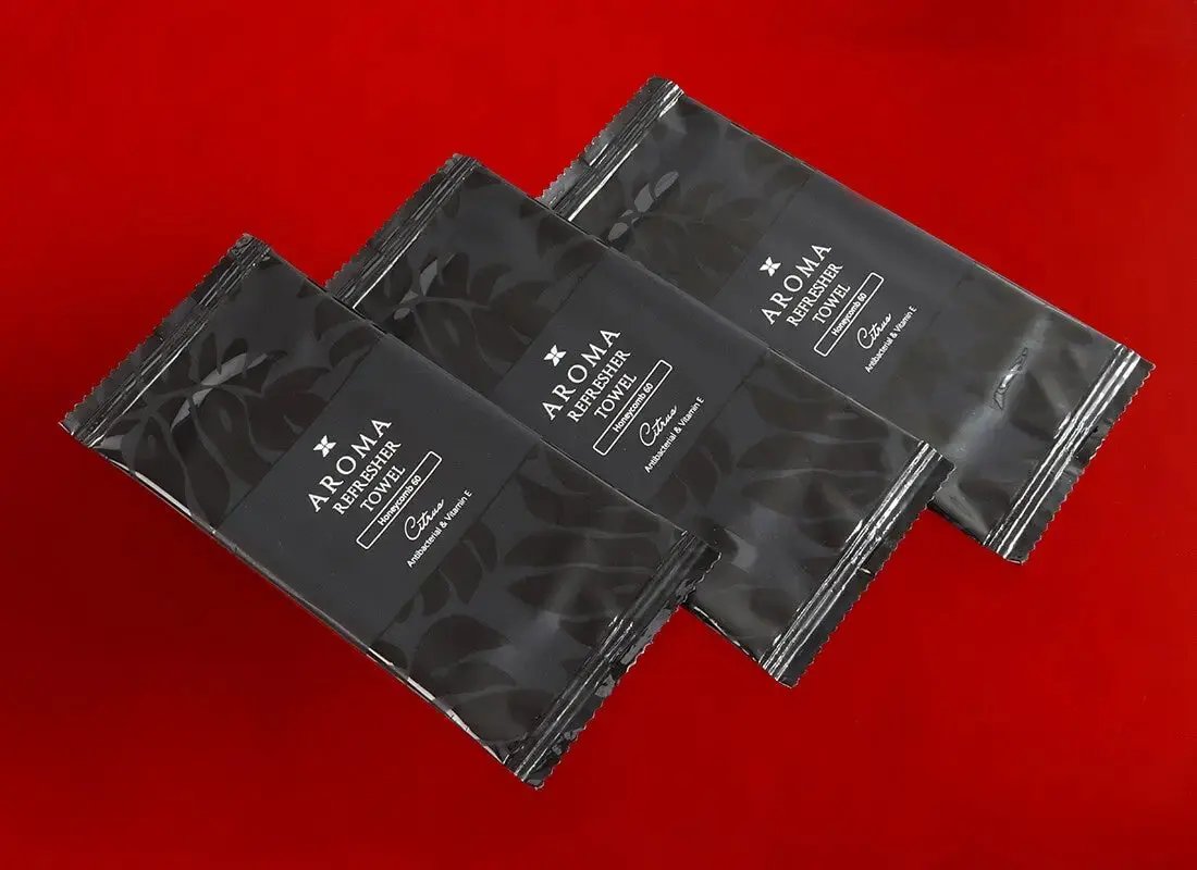3 Aroma 60 Black Xceed Towels refresher towel on red background