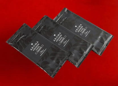 3 Aroma 60 Black Xceed Towels refresher towel on red background
